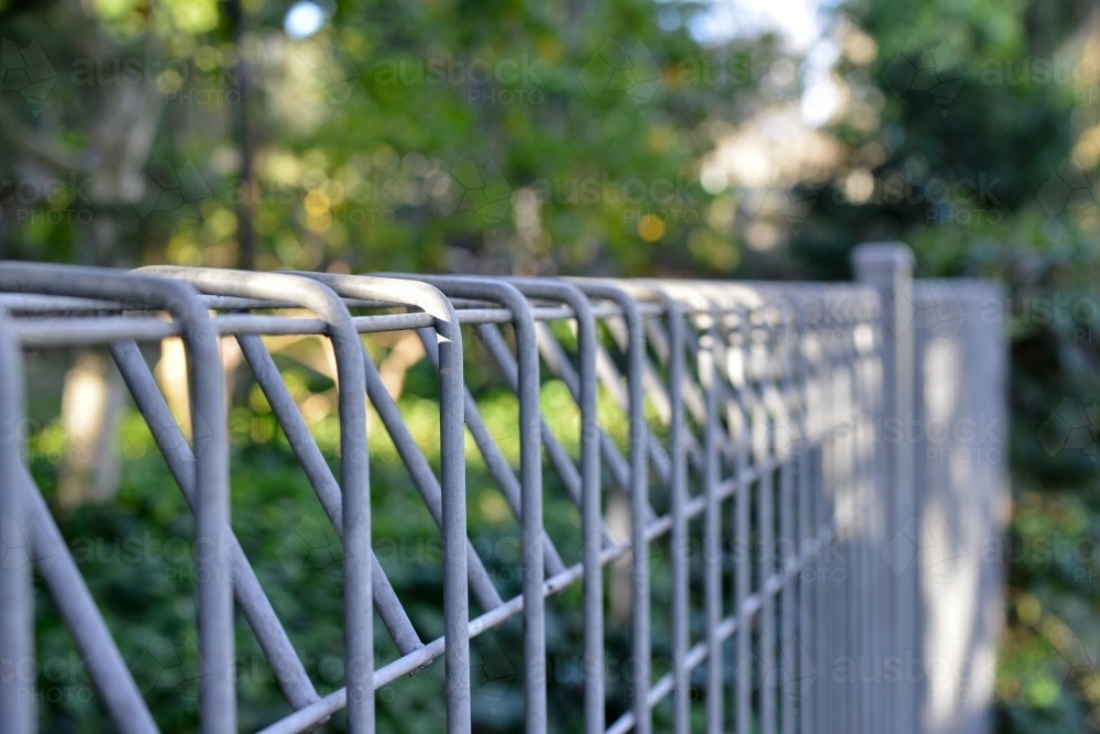 Metal property fencing up close - Australian Stock Image