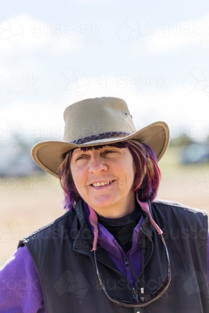 Middle aged country woman wearing hat - Australian Stock Image