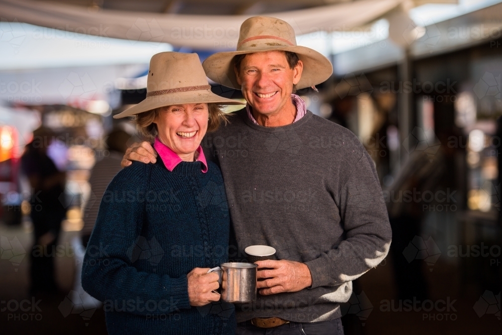 Middle-aged couple at country race meeting - Australian Stock Image