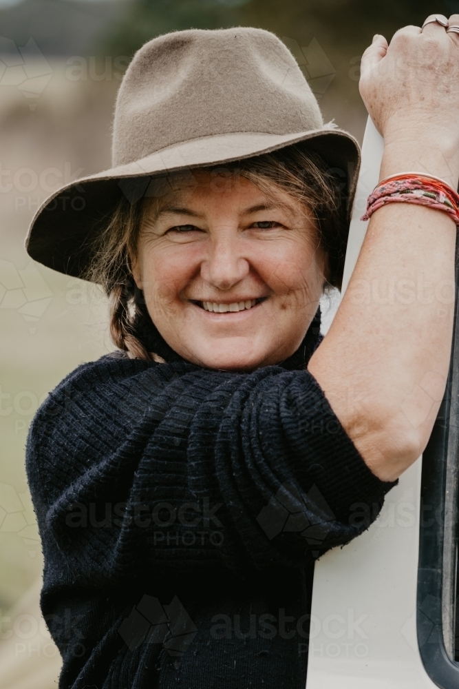 Middle aged woman smiles. - Australian Stock Image