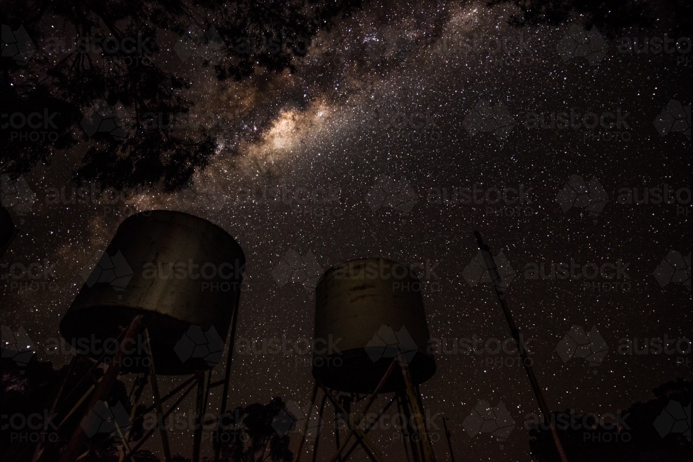 Milky way over fuel tanks - Australian Stock Image