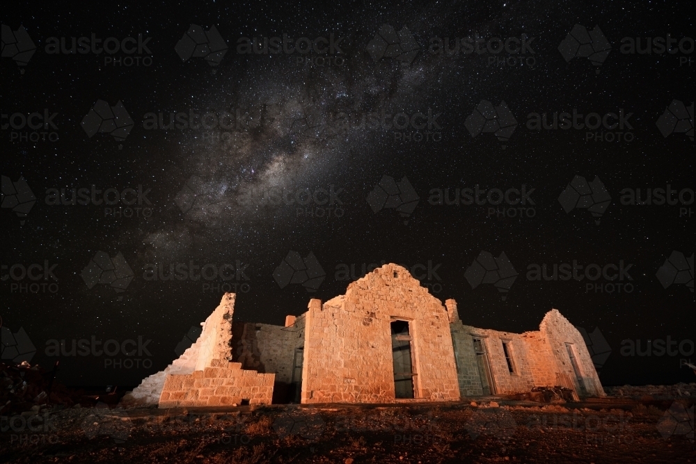 Milky way over old stone building - Australian Stock Image