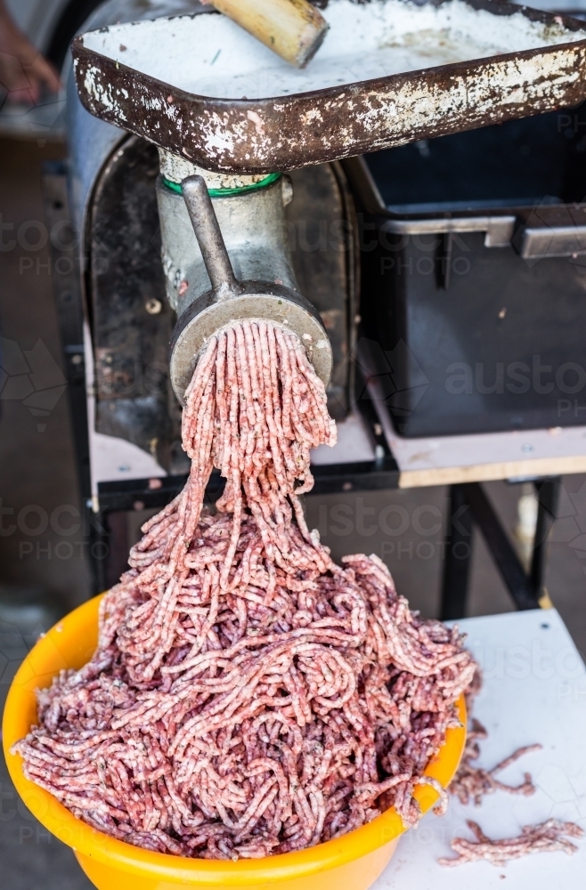 Image of minced meat from the mincer - Austockphoto