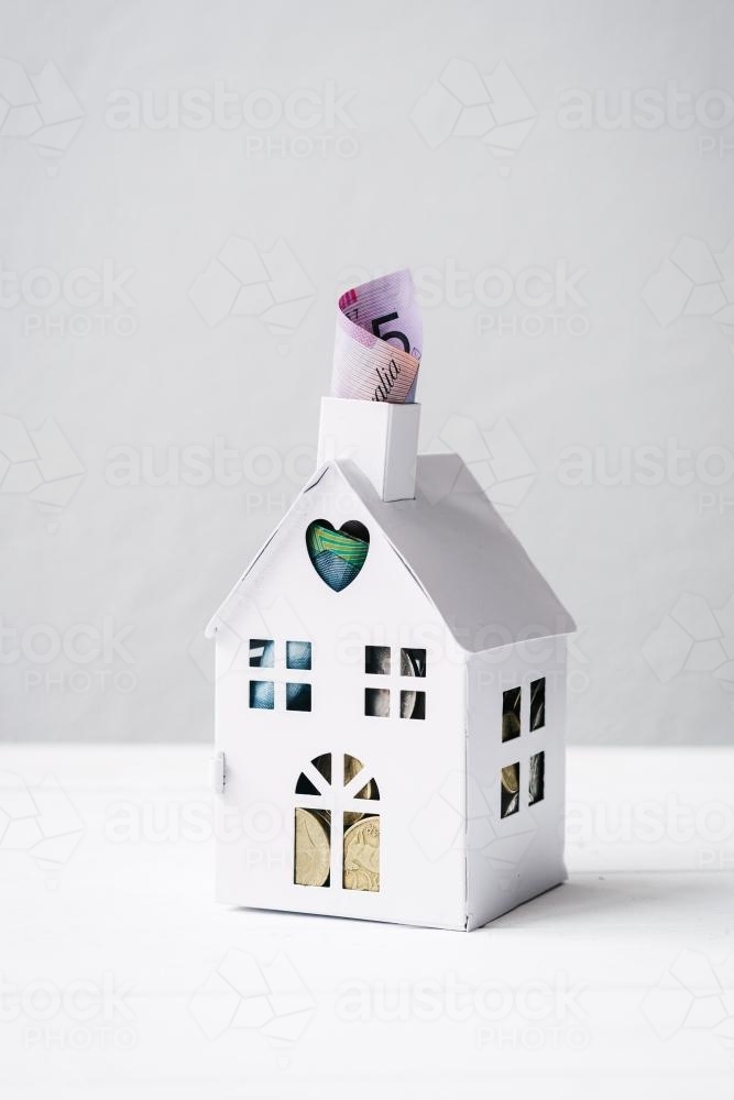mini house with australian money, concept for real estate, banking, insurance, investment - Australian Stock Image