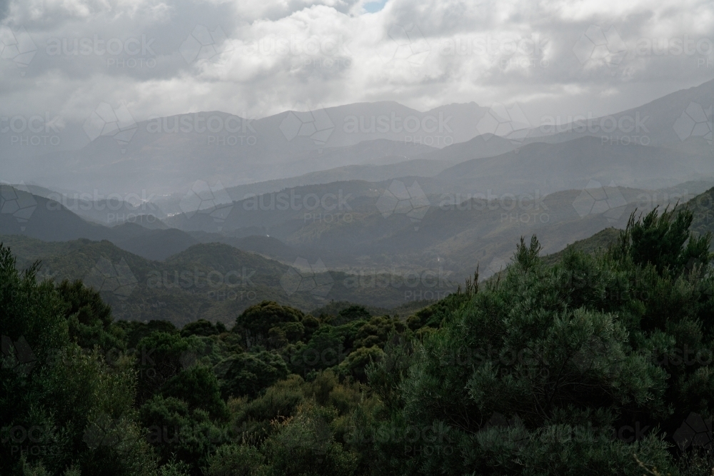 Misty mountains and valleys of Central Highlands, Tasmania - Australian Stock Image