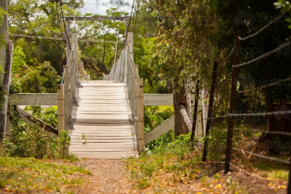 Mitchell St wooden foot bridge in country town - Australian Stock Image