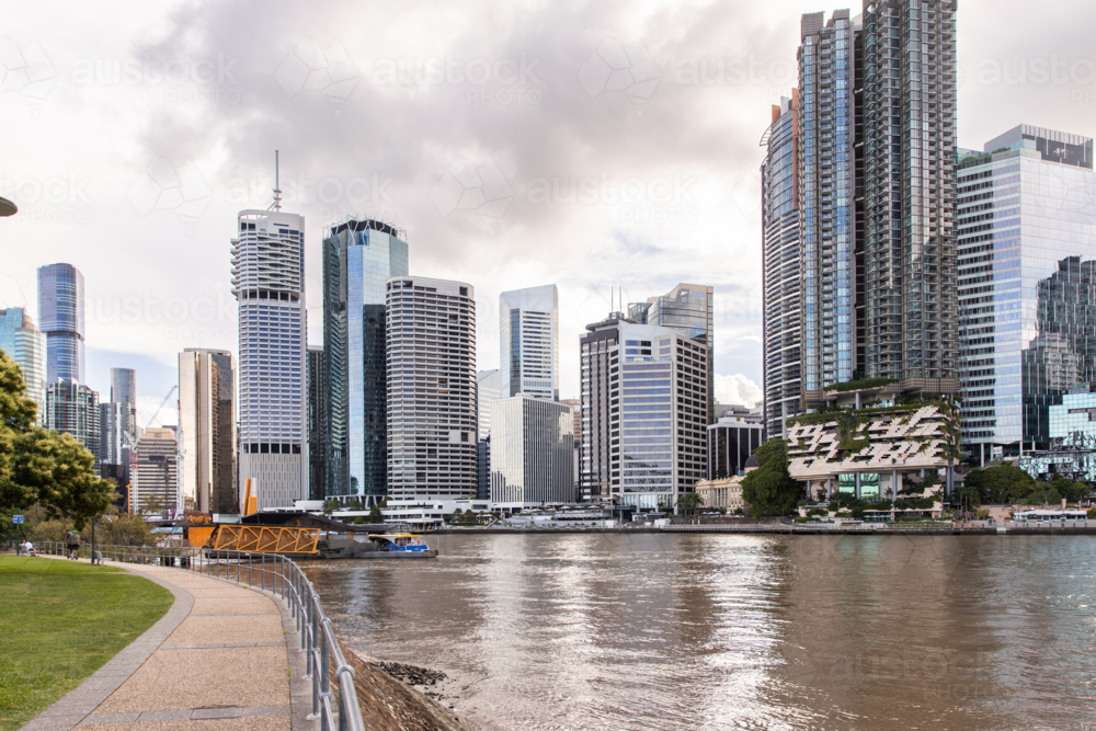 Mix of high-rise residential and commercial towers along the riverbank - Australian Stock Image
