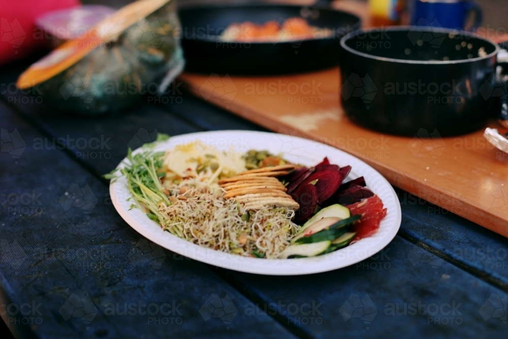 Mixed platter of healthy foods while camping - Australian Stock Image