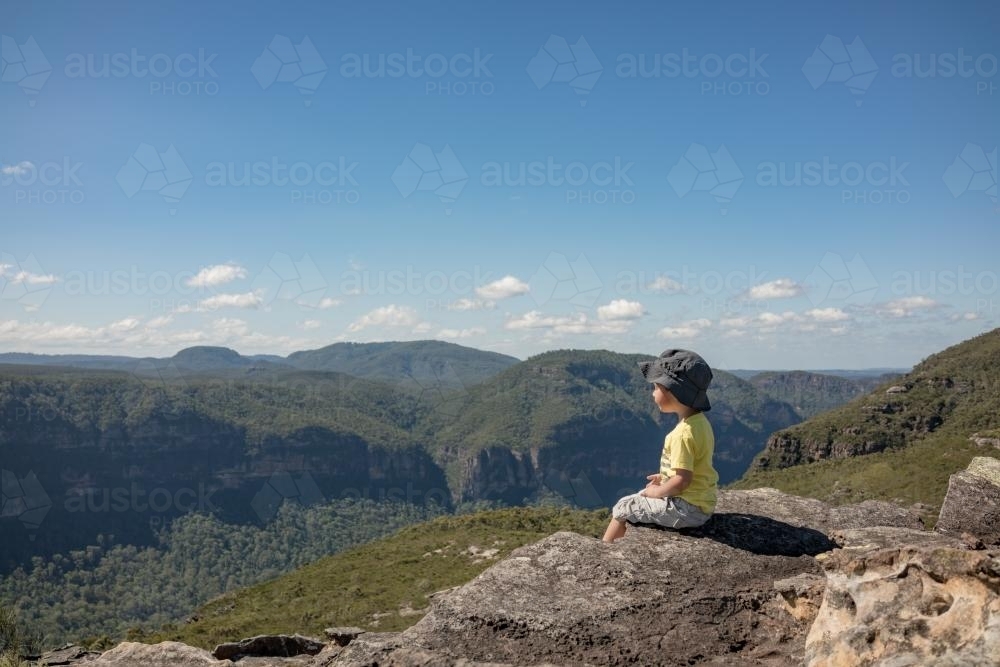 Mixed race boy bush walking in the Blue Mountains - Australian Stock Image