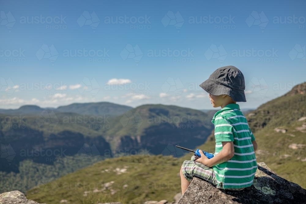 Mixed race boy bush walking in the Blue Mountains - Australian Stock Image