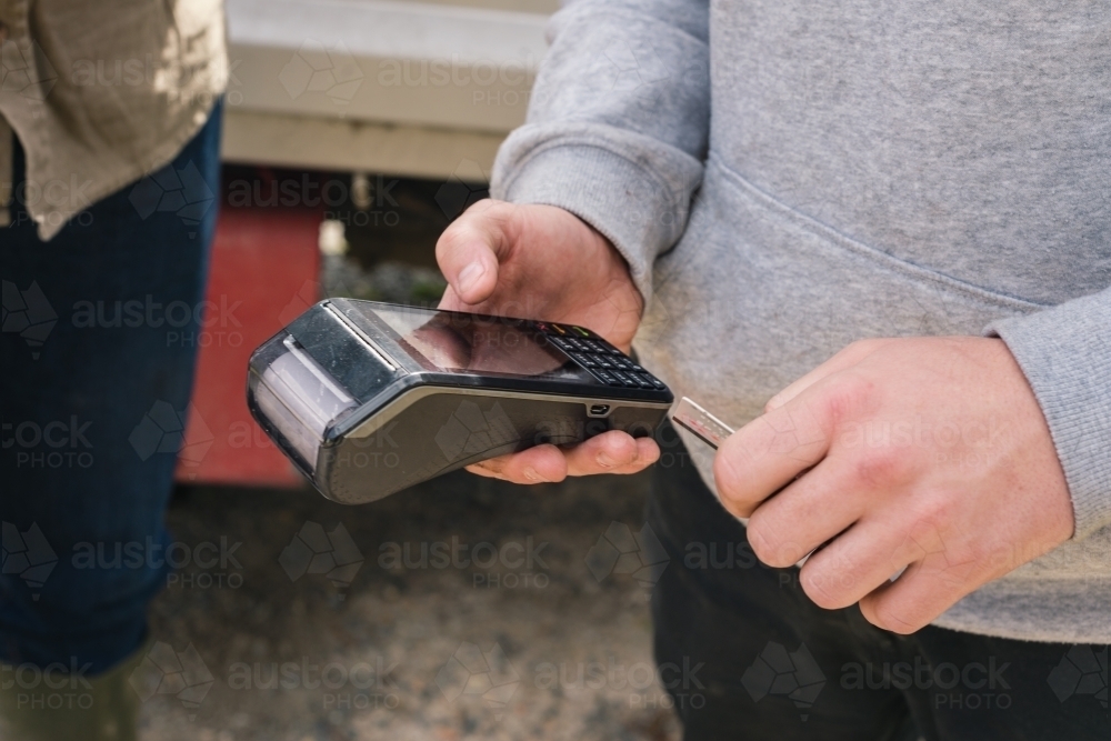 mobile eftpos payment machine - Australian Stock Image