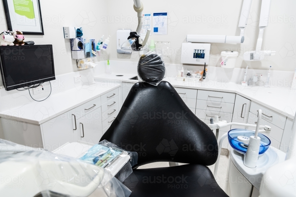 Modern dental treatment room with dental chair - Australian Stock Image