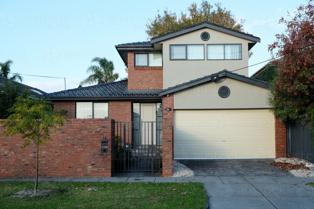 Modern double storey brick house - Australian Stock Image