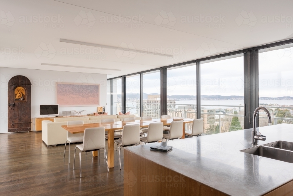 Modern interior of luxury city apartment overlooking Hobart city - Australian Stock Image