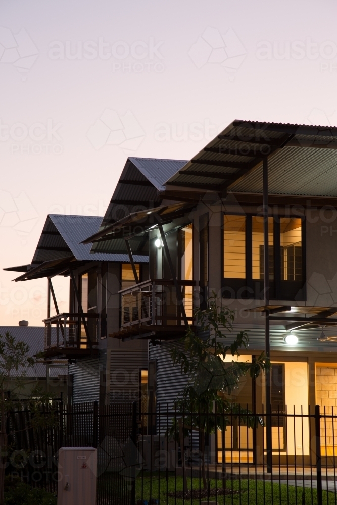 Modern townhouse development at dusk - Australian Stock Image