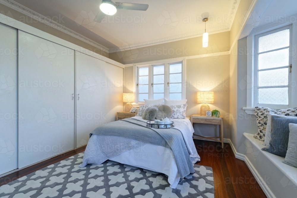 Image of Modern, trendy main bedroom with bay window seat in a ... Image of Modern, trendy main bedroom with bay window seat in a ...