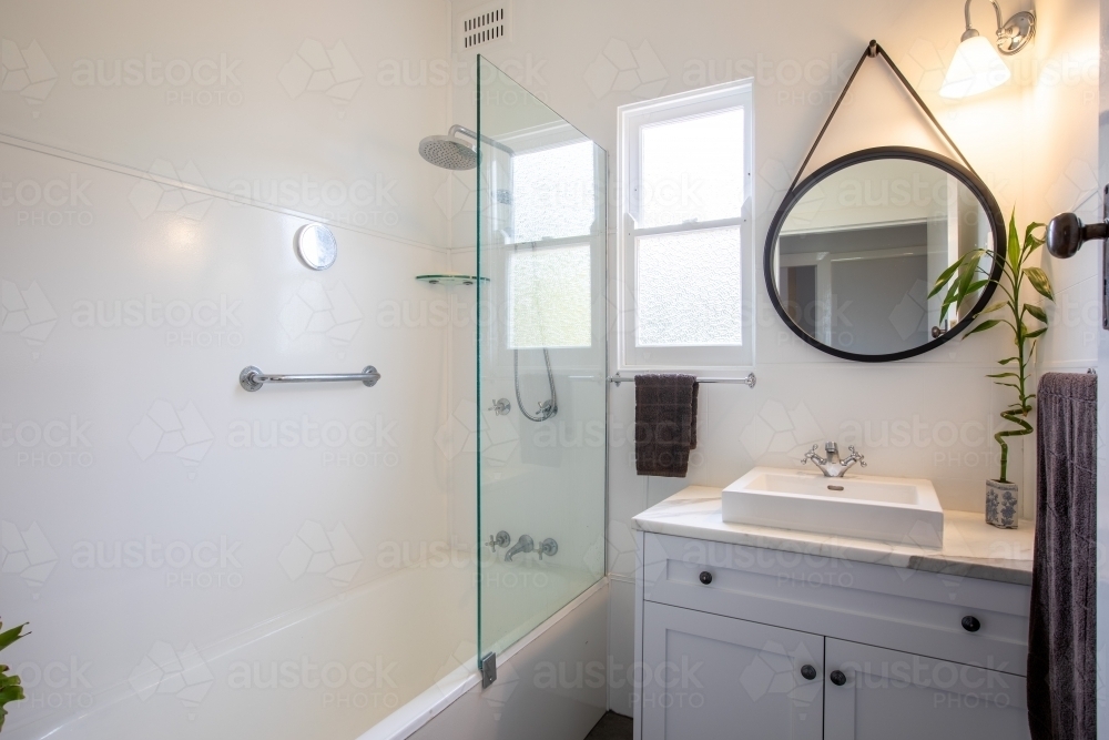 Modern White Bathroom with Greenery - Australian Stock Image