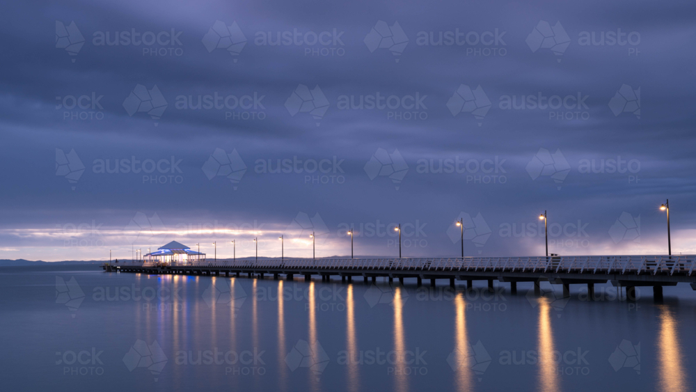 Moody sunrise Shorncliffe Pier - Australian Stock Image