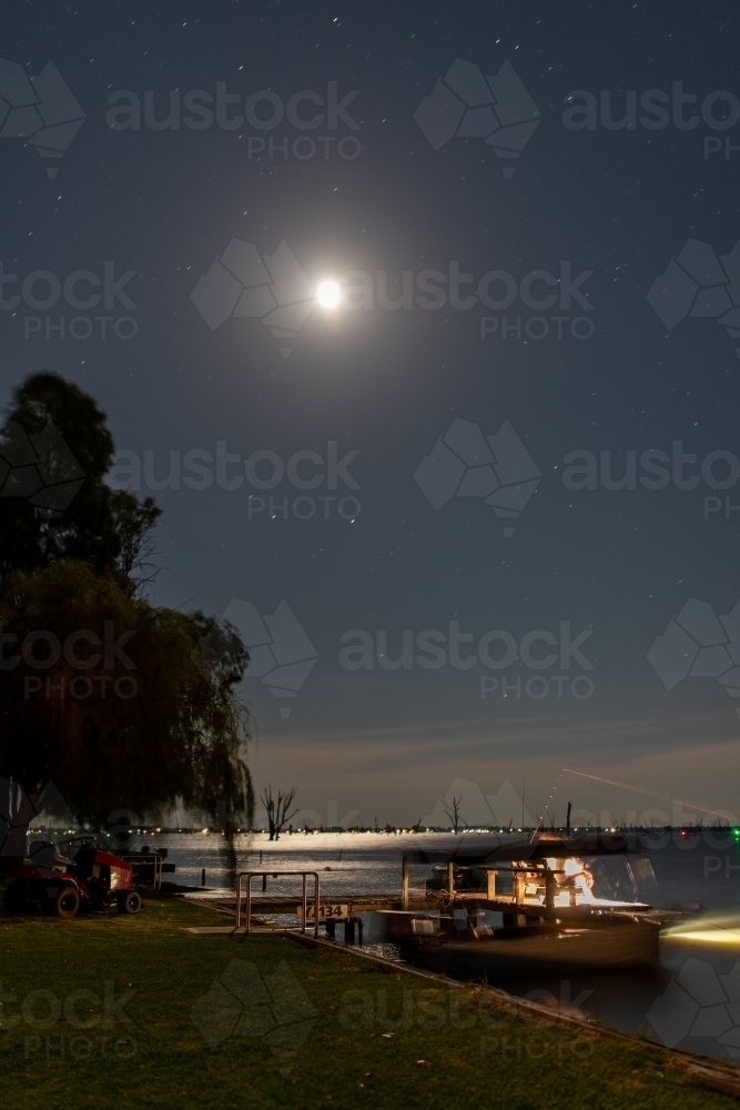 Moon light over lake edge - Australian Stock Image