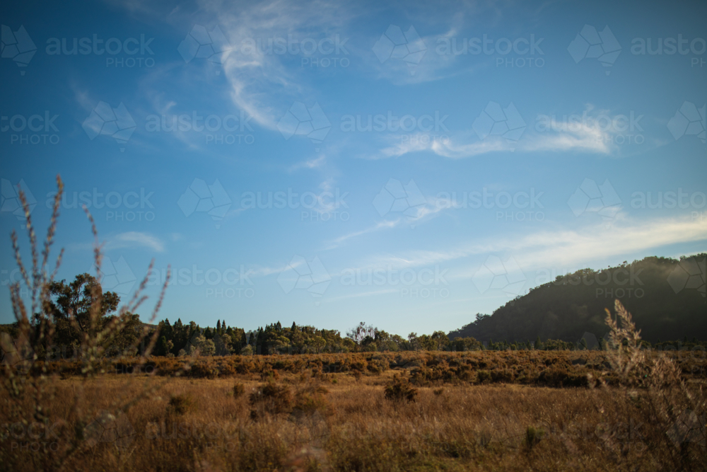 Morning fog rising over remote Australian countryside - Australian Stock Image