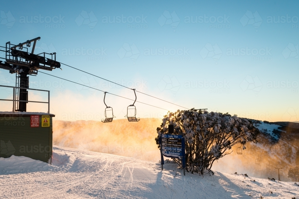 morning light at a ski field, with chairlift - Australian Stock Image