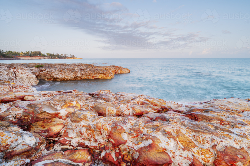 Morning light at Nightcliff Foreshore rocks, Darwin - Australian Stock Image