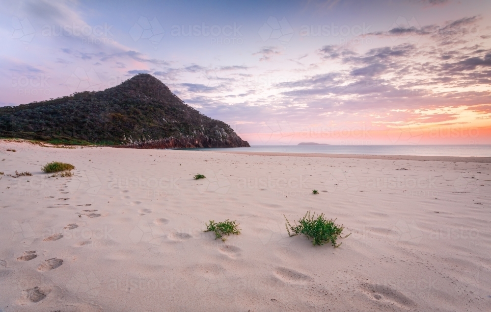 Morning light at Zenith Beach and Mt Tomaree in Port Stephens - Australian Stock Image
