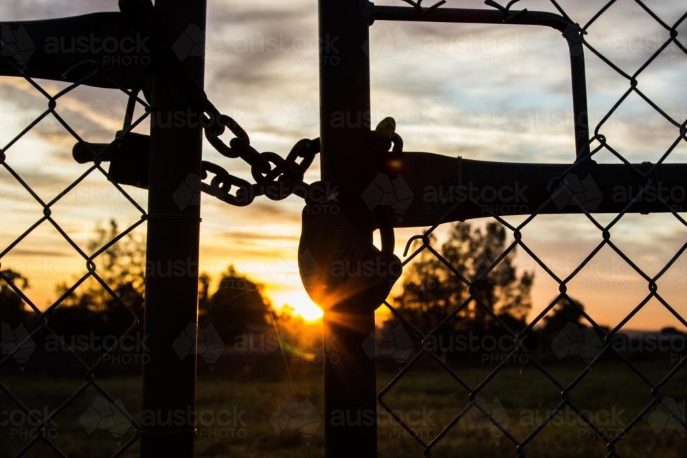 Image result for key padlock gate sunset