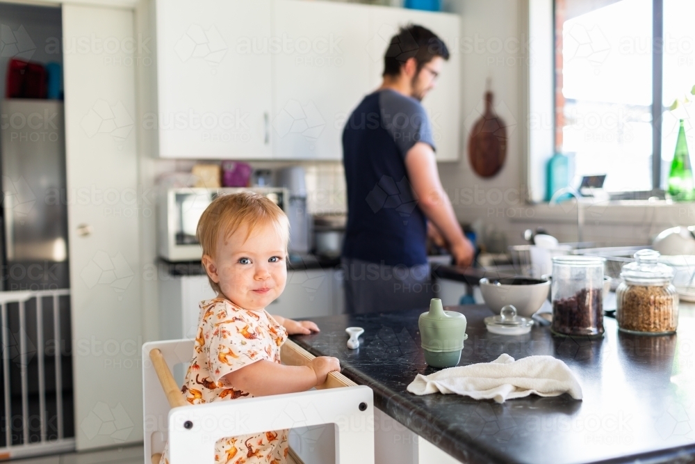 Image of Morning time routine getting breakfast ready - baby at bench ...