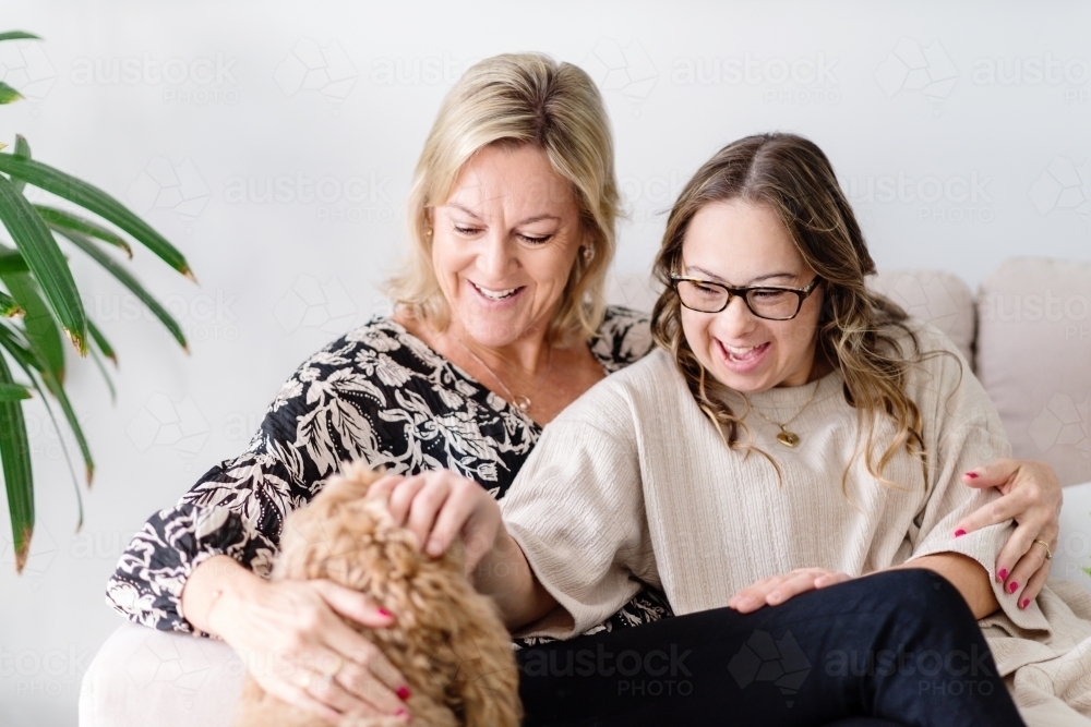 mother and daughter , from a series featuring a young woman with Down Syndrome - Australian Stock Image