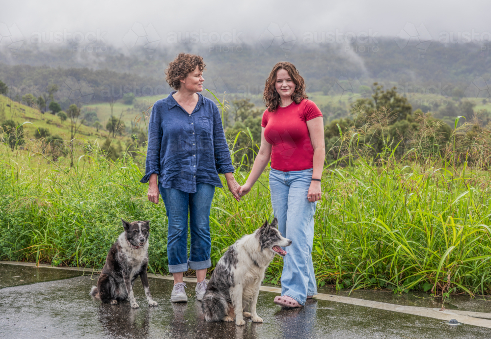 Mother and Daughter holding hands - Australian Stock Image