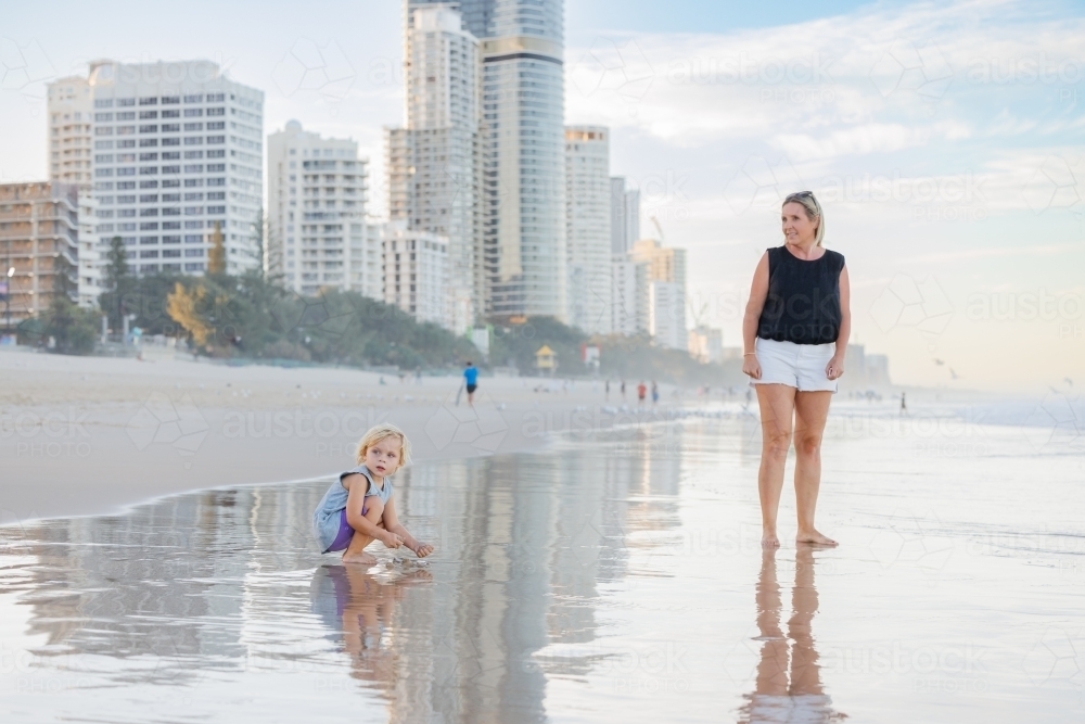 Mother and son enjoying Main Beach at Surfers Paradise on the Gold Coast - Australian Stock Image