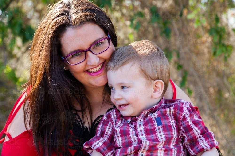 Mother and son smiling together - Australian Stock Image
