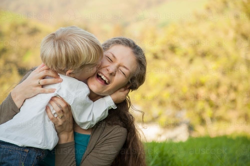 Mother and son together outside - Australian Stock Image
