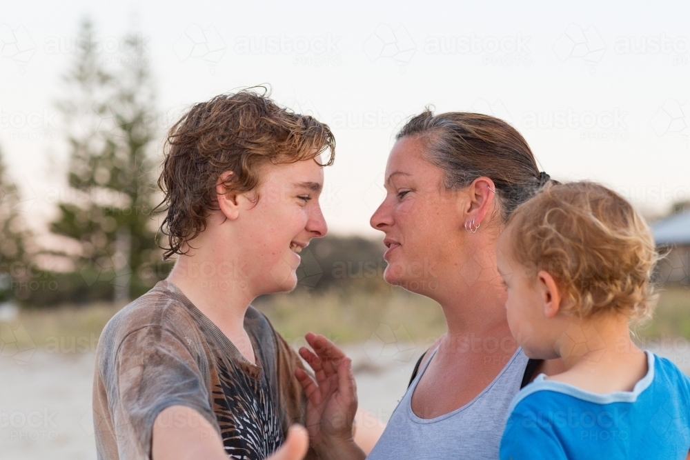 Mother with teenage boy and toddler - Australian Stock Image
