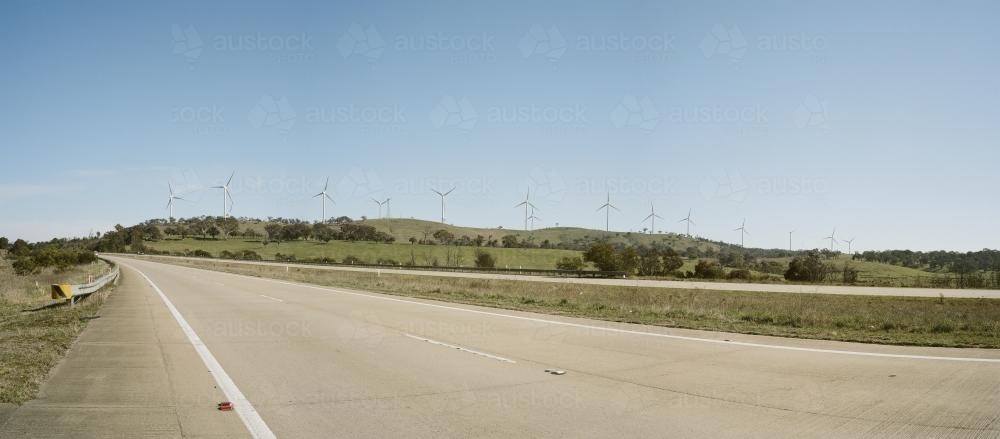 Motorway and hillside of wind turbines - Australian Stock Image