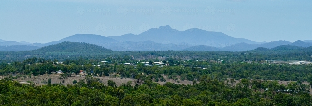 Mount Larcom in hazy light - Australian Stock Image