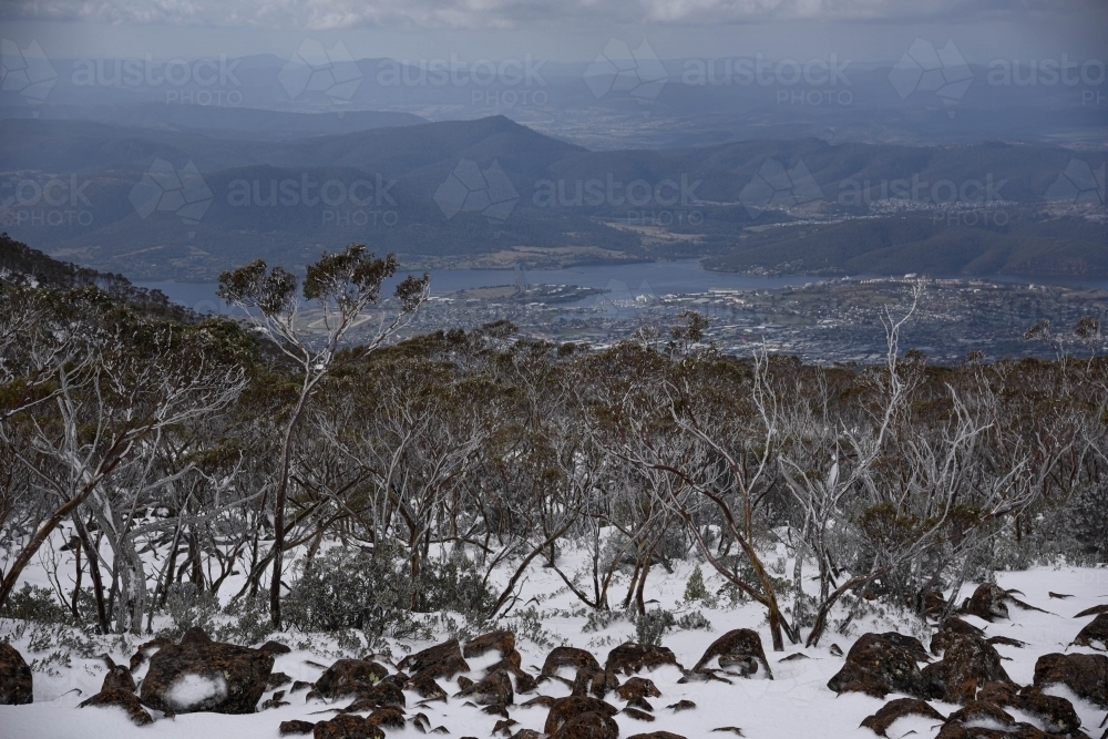 Mount Wellington summit views over Hobart in the snow - Australian Stock Image