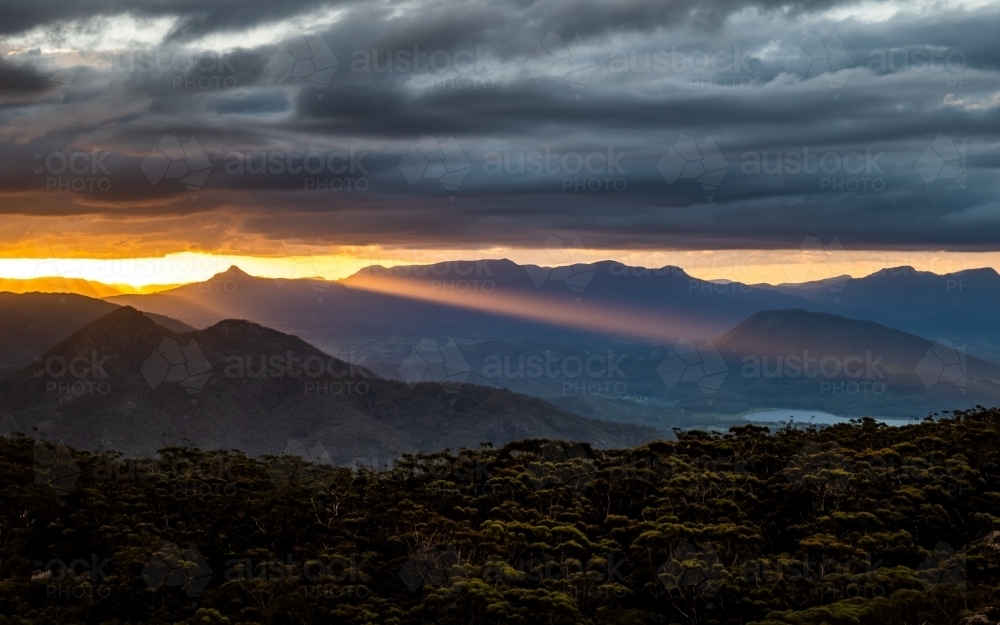 Image of mountain landscape at sunset - Austockphoto