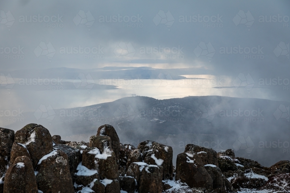 mountain landscape with rocks and snow - Australian Stock Image