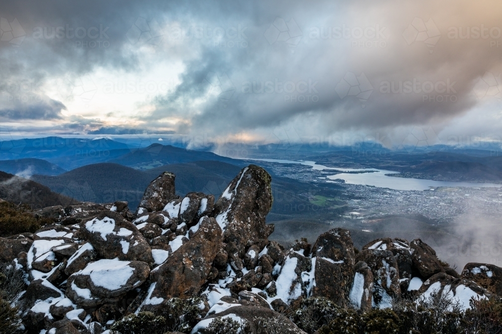 mountain landscape with rocks and snow - Australian Stock Image