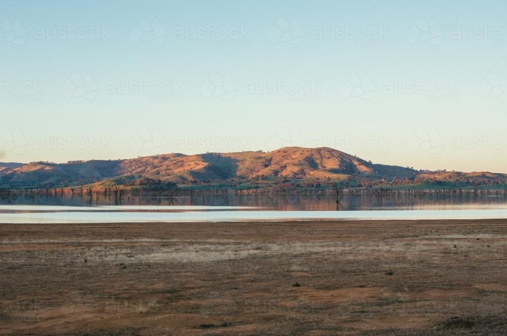Mountain reflecting off lake - Australian Stock Image