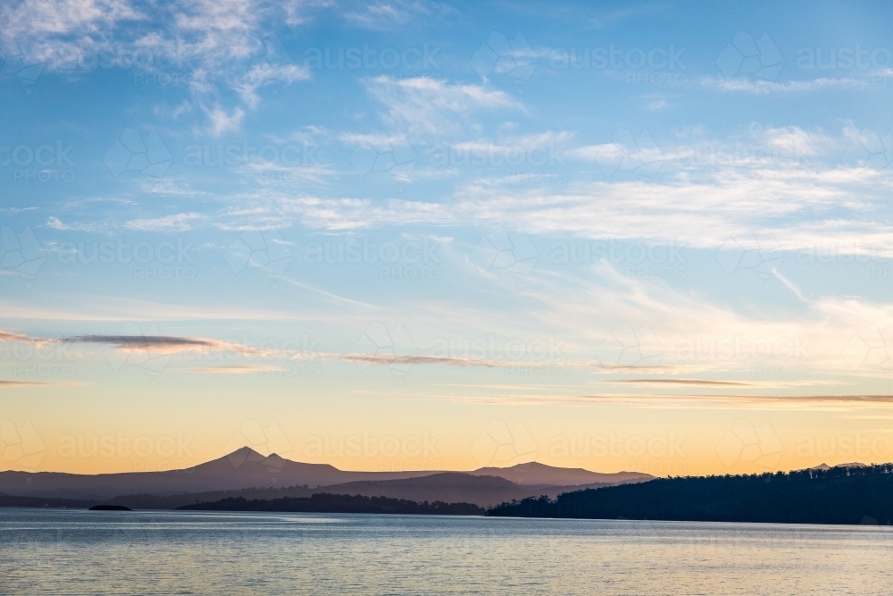 Mountains and river at sunset - Australian Stock Image