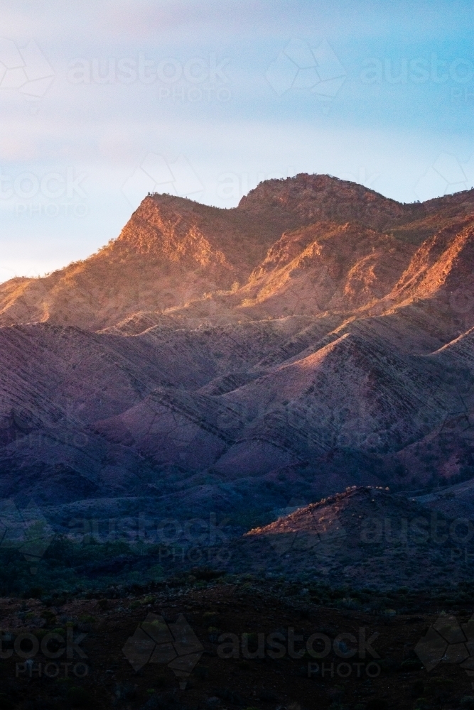 Mountains in early morning light vertical - Australian Stock Image