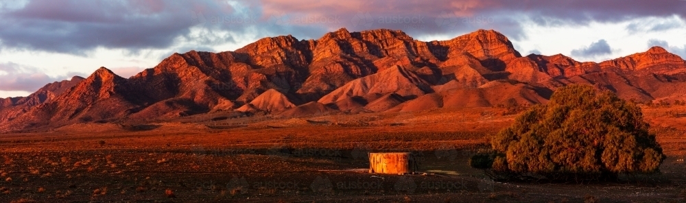 Mountains lit by setting sun - Australian Stock Image
