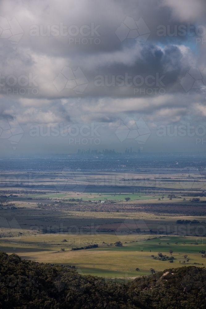Mountains, Paddocks, and the Melbourne City Skyline. - Australian Stock Image