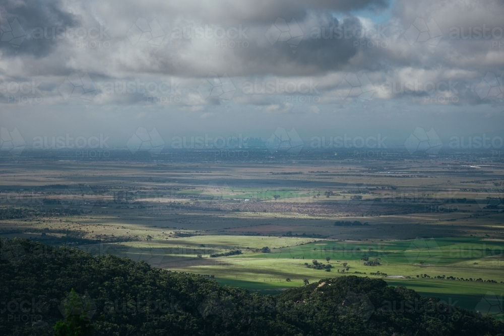 Mountains, Paddocks, and the Melbourne Skyline. - Australian Stock Image