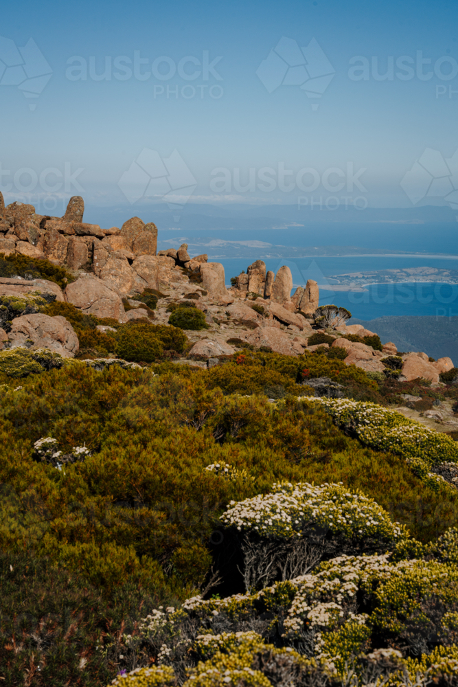 Mountains rugged rock terrain over the coast - Australian Stock Image