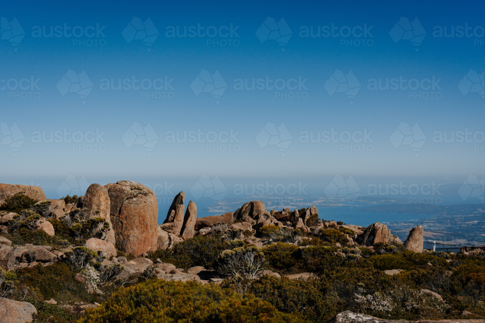 Mountains rugged rock terrain over the coast - Australian Stock Image