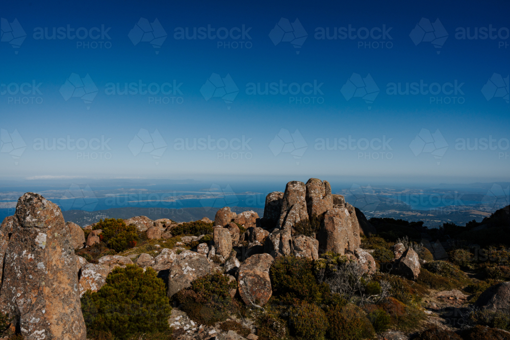 Mountains rugged rock terrain over the coast - Australian Stock Image